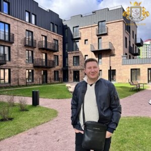 The founder of Royal Facade inspects an insulated residential complex