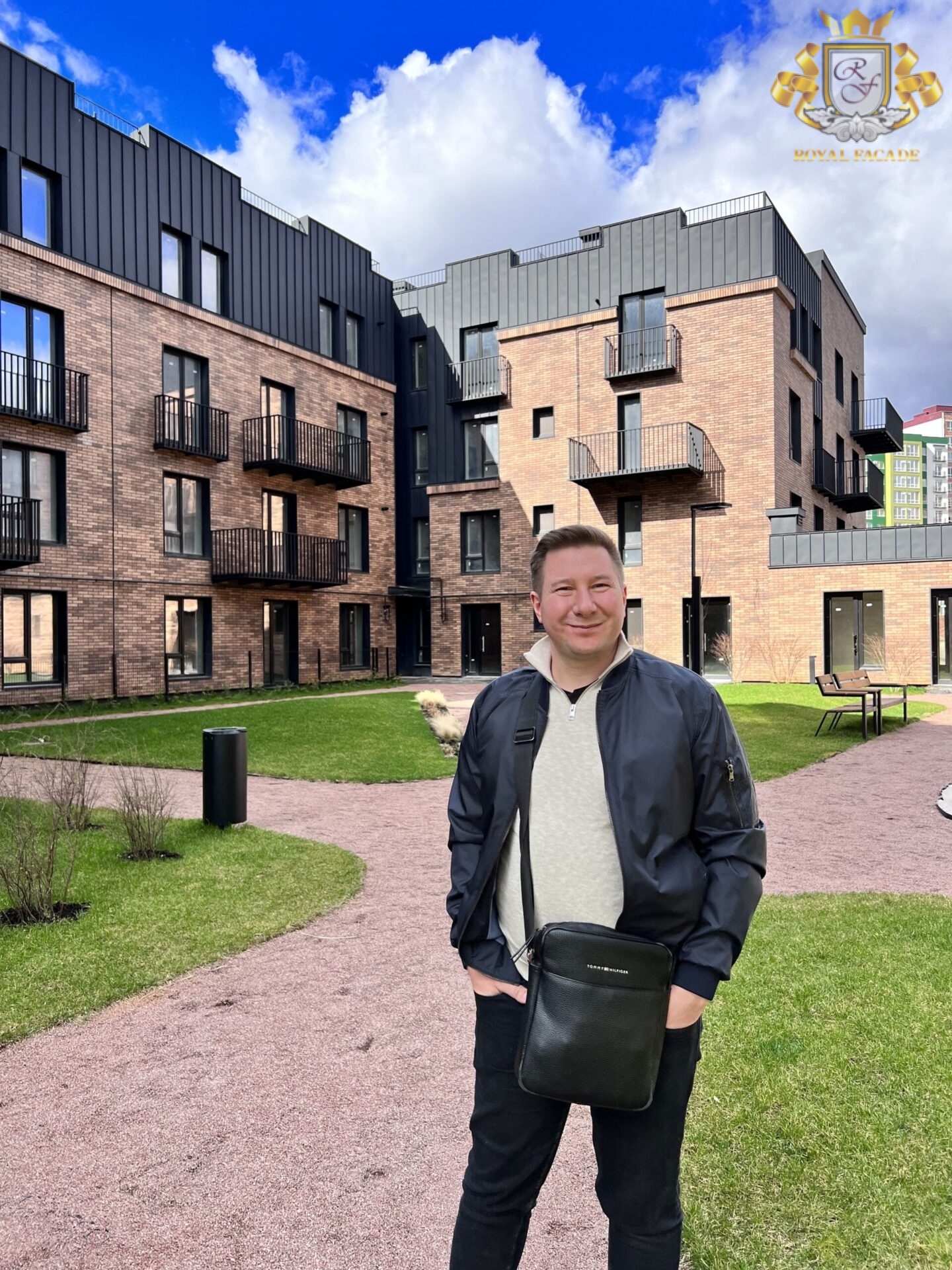 The founder of Royal Facade inspects an insulated residential complex