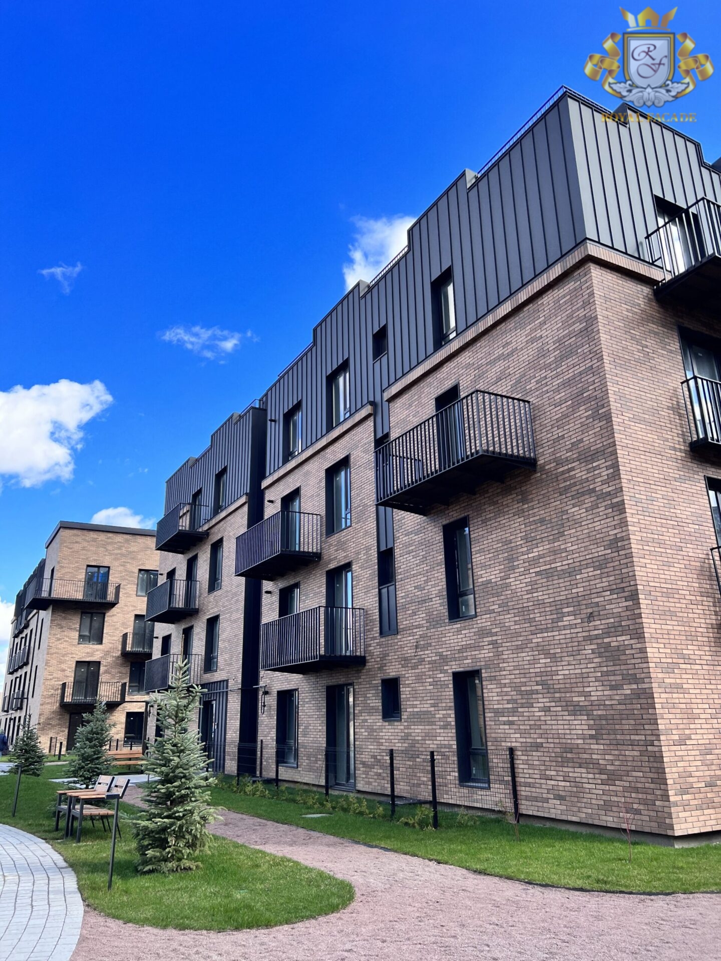 Courtyard and facade of a multi-storey building with new insulation, Ivano-Frankivsk