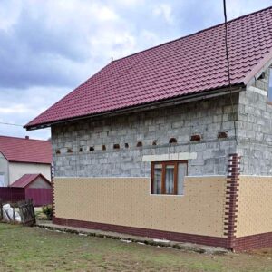 Izolarea unei case în munții din Transcarpatia cu panouri termice Royal Facade