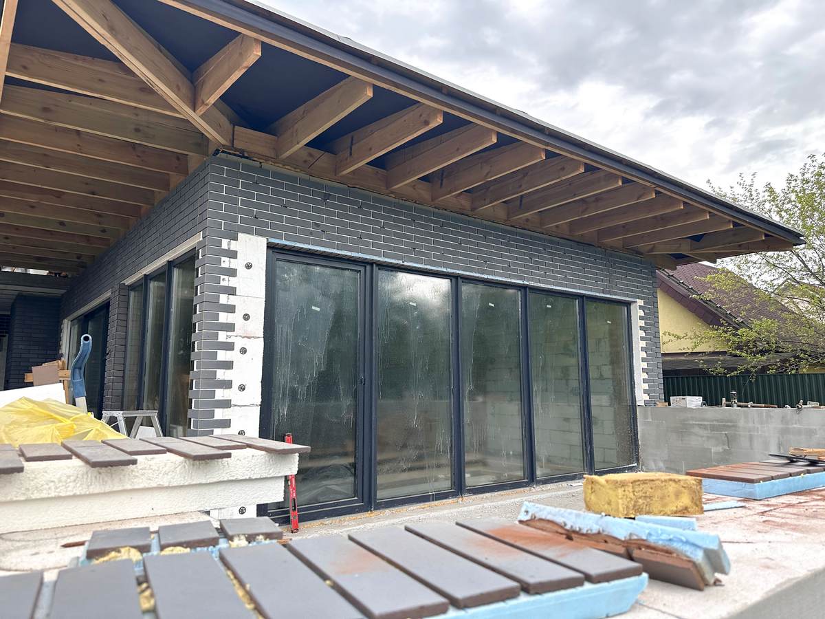 Insulation of a private house in the Kyiv region with thermal panels with Misty Morning tiles