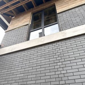 Installation of King Klinker Misty Morning thermal panels on a private house