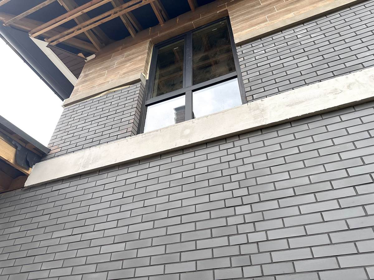 Installation of King Klinker Misty Morning thermal panels on a private house