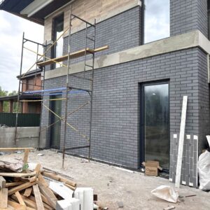 Aesthetic facade cladding with thermal panels with expanded polystyrene