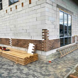 Izolacja termiczna domu w Mykuliczynie panelami elewacyjnymi Golden Tile