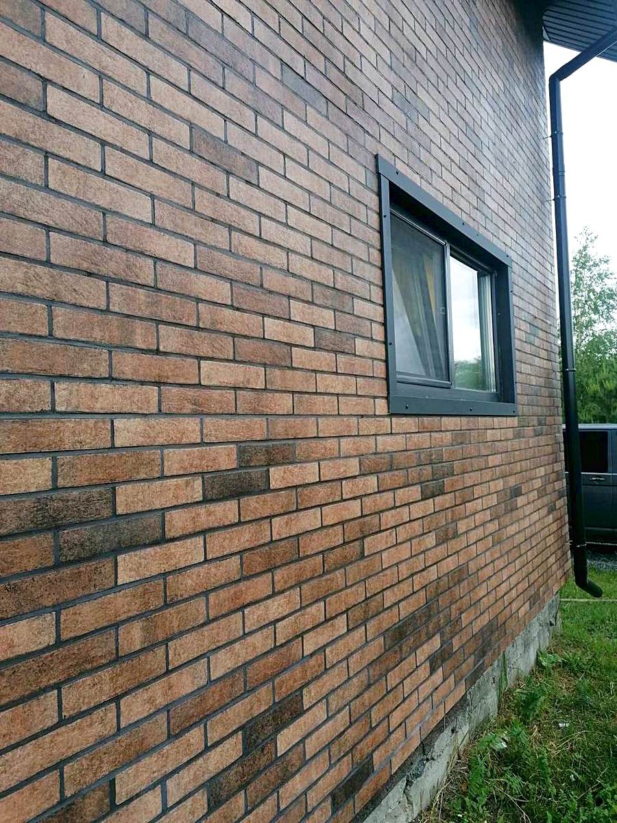 Installation of Seven Tones Orange thermal panels with polystyrene foam insulation