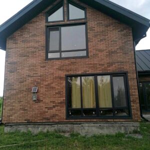 Facing the facade of a house in Khmelnytskyi with Golden Tile tiles