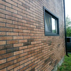 Installation of Seven Tones Orange thermal panels with polystyrene foam insulation