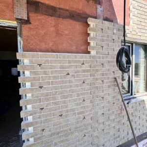 Izolacja domu w dzielnicy Bucha za pomocą paneli termicznych