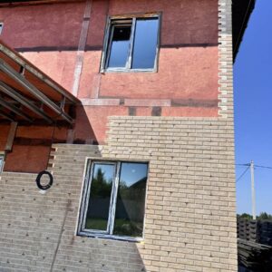 Ocieplona fasada domu w miejscowości Shepitky