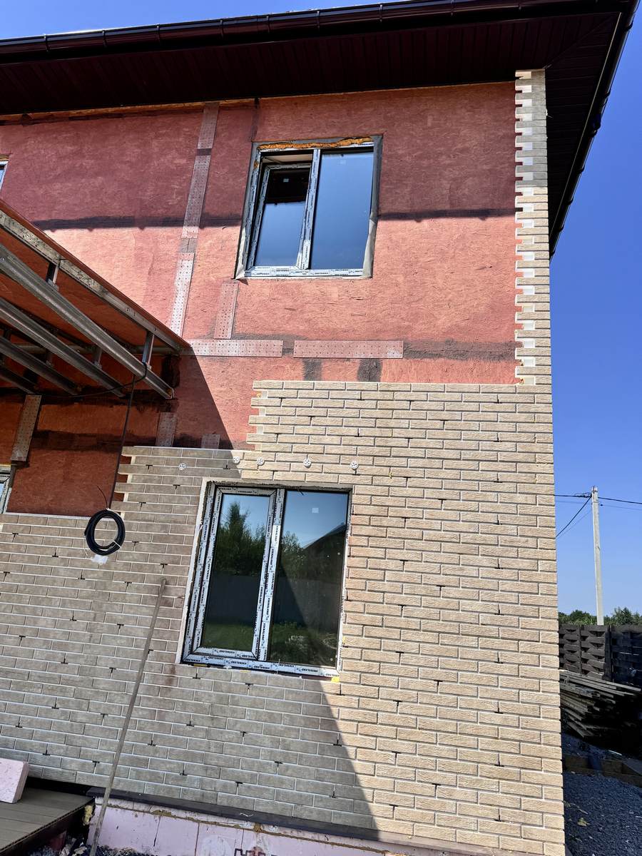 Ocieplona fasada domu w miejscowości Shepitky