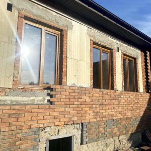 Thermal panels with Neopor graphite insulation on the facade of a house