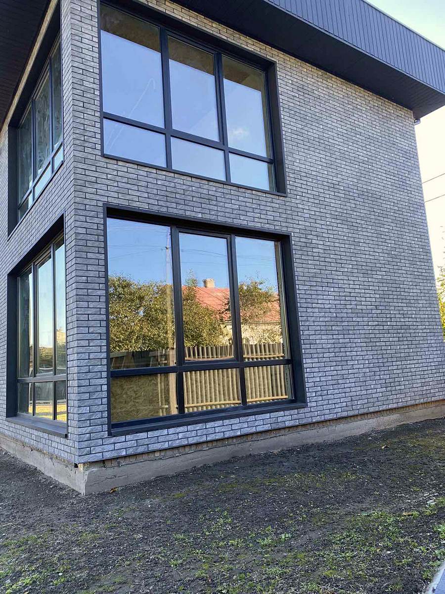 Rezultatul izolării fațadei unei case cu panouri termoizolante