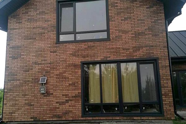 Facing the facade of a house in Khmelnytskyi with Golden Tile tiles