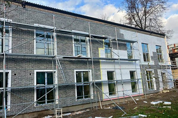 Thermal panels with 50 mm thick insulation on the facade of a house