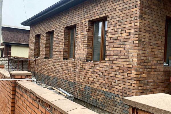 Insulated facade of the house with Cerrad and Paradyz tiles