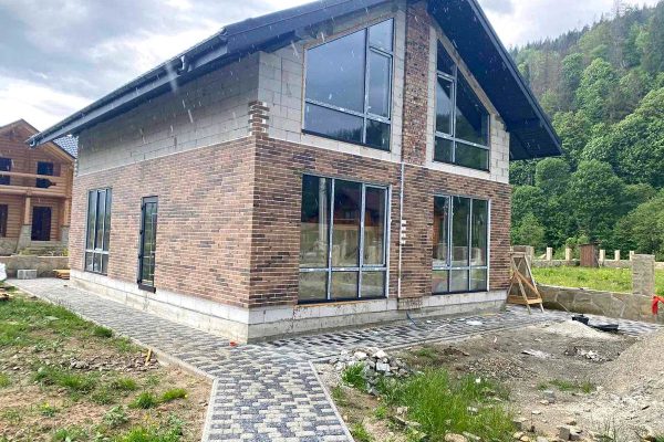 Installation of clinker thermal panels Golden Tile on the house